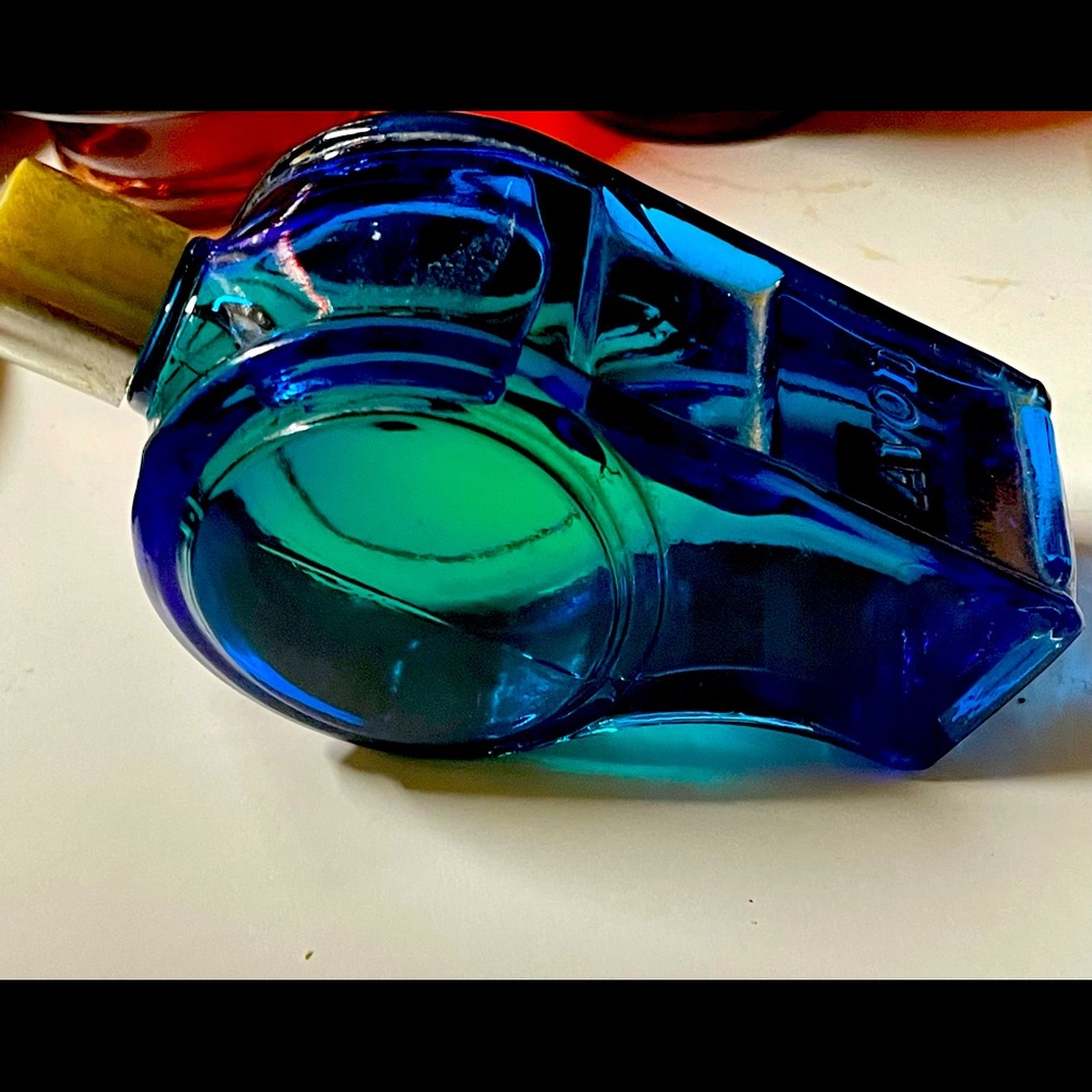 Vintage Avon bottle still full whistle shape deep blue color